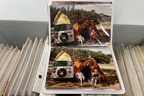 Two archival images of people travelling in a kombi van.